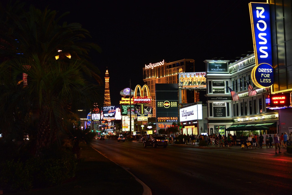 Colourful neon casino lights at night representing Adventplay Asean